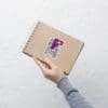 Sassy Hip Carry Clip sticker on notebook.