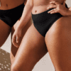 Women in black high-leg underwear.
