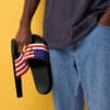 Person holding American flag slides.
