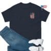 Distressed American flag on navy t-shirt.