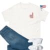 Patriotic t-shirt, jeans, and sneakers.