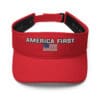 Red visor with "America First" and flag.