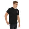 Man in black Montana Fire t-shirt.