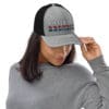 Gray trucker hat: Pissed Off Redneck.