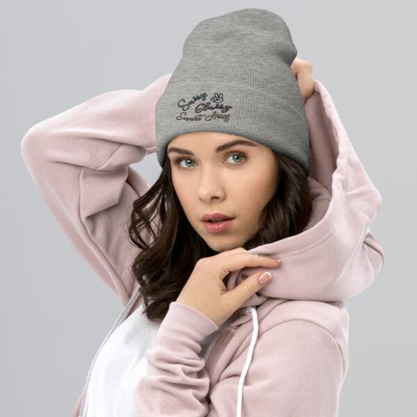 Woman in gray beanie; sassy, classy, smart, assy.