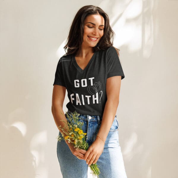 Woman wearing "Got Faith?" T-shirt.