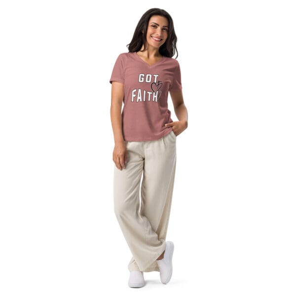 Woman in mauve "Got Faith" T-shirt.